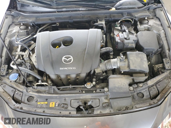 2019 Mazda 3 Select z VIN JM1BPACL2K1106950, wystawiony jako Copart lot #59481345 z przebiegiem 56 582 mil mil oraz Szkoda całkowita • Salvage title. Historia ofert i sprzedaży dostępna na DreamBid. Obrazek 11.
