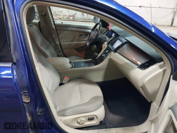 2013 Ford Taurus SEL with VIN 1FAHP2E82DG149828, listed as a IAAI auction lot 41910513 with 130,594 mi miles and . Bid and sale history available at carsss.com. Image 5.
