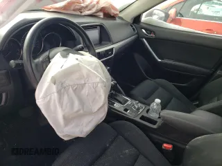 2016 Mazda CX-5 Touring z VIN JM3KE4CY1G0703496, wystawiony jako Copart lot #43806525 z przebiegiem Nie podano mil oraz Szkoda całkowita • Salvage title. Historia ofert i sprzedaży dostępna na DreamBid. Obrazek 7.