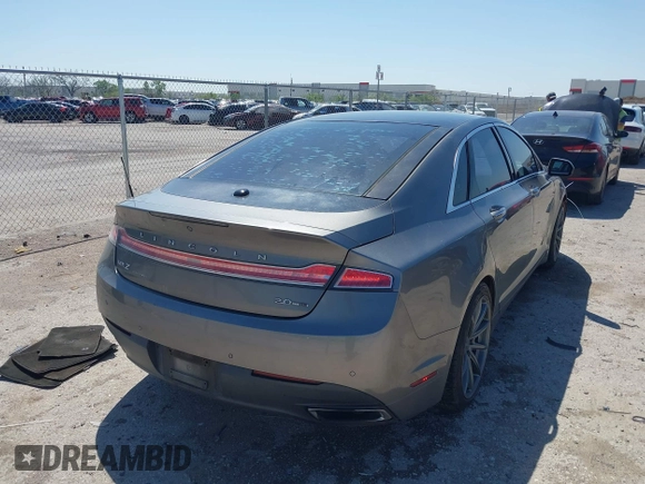 2014 Lincoln MKZ z VIN 3LN6L2G92ER835456, wystawiony jako IAAI lot #41985573 z przebiegiem 174 080 mil mil oraz . Historia ofert i sprzedaży dostępna na DreamBid. Obrazek 4.
