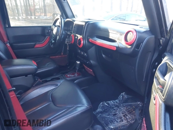 2017 Jeep Wrangler Unlimited Rubicon Recon z VIN 1C4BJWFG4HL723096, wystawiony jako IAAI lot #41393584 z przebiegiem 102 045 mil mil oraz . Historia ofert i sprzedaży dostępna na DreamBid. Obrazek 5.