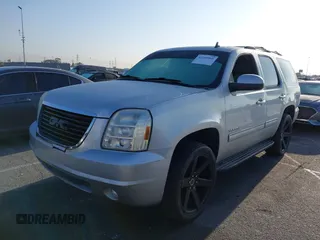 2010 GMC Yukon SLT with VIN 1GKUCCE00AR255901, listed as a IAAI auction lot 42149960 with 196,014 mi miles. Bid and sale history available at carsss.com. Image 2.