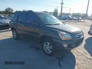 2005 Kia Sportage LX z VIN KNDJF723757132772, wystawiony jako IAAI lot #41436925 z przebiegiem 134 653 mil mil oraz . Historia ofert i sprzedaży dostępna na DreamBid. Obrazek 1.