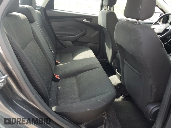 2018 Ford Focus SE z VIN 1FADP3F24JL204488, wystawiony jako Copart lot #54733625 z przebiegiem Nie podano mil oraz Szkoda całkowita • Salvage title. Historia ofert i sprzedaży dostępna na DreamBid. Obrazek 10.