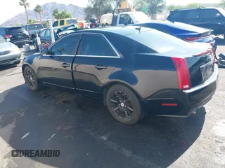 2008 Cadillac CTS RWD z VIN 1G6DF577180143506, wystawiony jako IAAI lot #42422201 z przebiegiem 157 003 mil mil oraz . Historia ofert i sprzedaży dostępna na DreamBid. Obrazek 3.