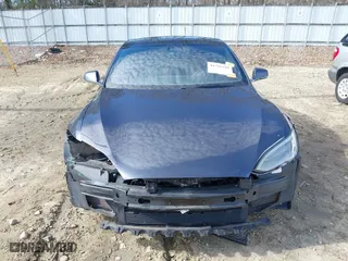 2017 Tesla Model S 100D with VIN 5YJSA1E23HF198592, listed as a IAAI auction lot 41721755 with 127,946 mi miles. Bid and sale history available at carsss.com. Image 13.