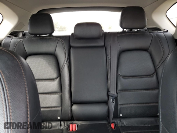 2021 Mazda CX-5 Grand Touring with VIN JM3KFBDM7M1122281, listed as a Copart auction lot 54576485 with 93,008 mi miles and Salvage Title. Bid and sale history available at DreamBid. Image 10.