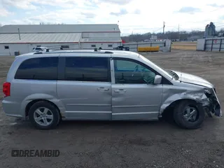2011 Dodge Grand Caravan Crew with VIN 2D4RN5DG0BR751611, listed as a IAAI auction lot 41683889 with 181,551 mi miles and . Bid and sale history available at DreamBid. Image 13.