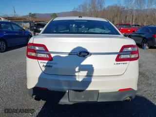 2013 Ford Taurus Limited with VIN 1FAHP2F82DG131585, listed as a IAAI auction lot 41076163 with 134,916 mi miles. Bid and sale history available at carsss.com. Image 17.