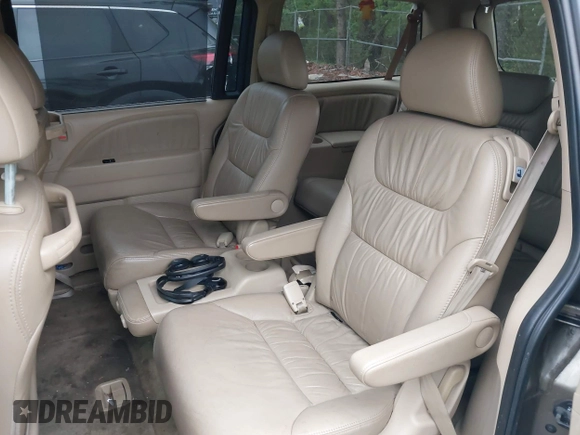 2009 Honda Odyssey EX-L with VIN 5FNRL38759B022866, listed as a IAAI auction lot 42200965 with 145,641 mi miles and . Bid and sale history available at DreamBid. Image 8.