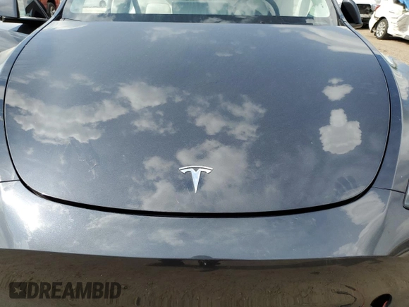 2024 Tesla Model Y Long Range z VIN 7SAYGAEE7RF123224, wystawiony jako Copart lot #58410545 z przebiegiem Nie podano mil oraz Szkoda całkowita • Salvage title. Historia ofert i sprzedaży dostępna na DreamBid. Obrazek 11.