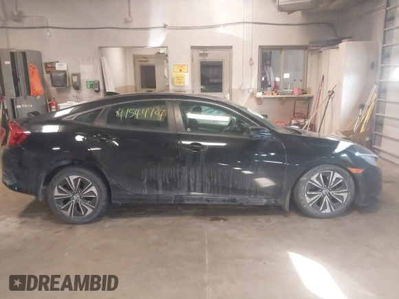 2017 Honda Civic EX-T with VIN 19XFC1E36HE020833, listed as a IAAI auction lot 41544107 with 95,425 mi miles and . Bid and sale history available at DreamBid. Image 13.
