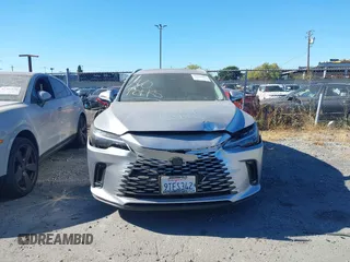 2025 Lexus RX 350h with VIN 2T2BBMCA8SC084121, listed as a IAAI auction lot 42644072 with 4,200 mi miles and . Bid and sale history available at DreamBid. Image 12.