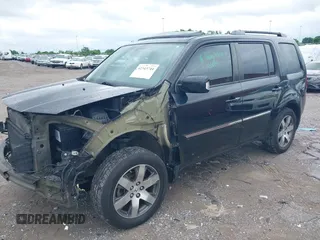 2013 Honda Pilot Touring z VIN 5FNYF3H93DB021700, wystawiony jako IAAI lot #42343744 z przebiegiem 224 264 mil mil oraz . Historia ofert i sprzedaży dostępna na DreamBid. Obrazek 17.