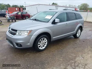 2015 Dodge Journey SXT with VIN 3C4PDCBG9FT722934, listed as a IAAI auction lot 41915676 with 144,796 mi miles. Bid and sale history available at carsss.com. Image 2.