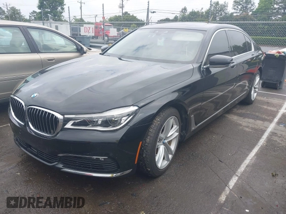 2018 BMW 7 Series 750i z VIN WBA7F0C59JGM23945, wystawiony jako IAAI lot #42236737 z przebiegiem 65 576 mil mil oraz . Historia ofert i sprzedaży dostępna na DreamBid. Obrazek 2.