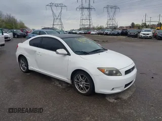 2007 Scion tC Spec with VIN JTKDE177270146530, listed as a IAAI auction lot 42033365 with 128,482 mi miles. Bid and sale history available at carsss.com. Image 1.