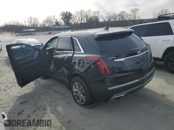 2023 Cadillac XT5 FWD Premium Luxury z VIN 1GYKNCRS6PZ145494, wystawiony jako Copart lot #45475375 z przebiegiem 48 339 mil mil oraz Szkoda całkowita • Salvage title. Historia ofert i sprzedaży dostępna na DreamBid. Obrazek 2.