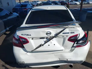 2018 Nissan Altima SR with VIN 1N4AL3AP2JC163232, listed as a IAAI auction lot 41818746 with 73,707 mi miles and . Bid and sale history available at carsss.com. Image 16.