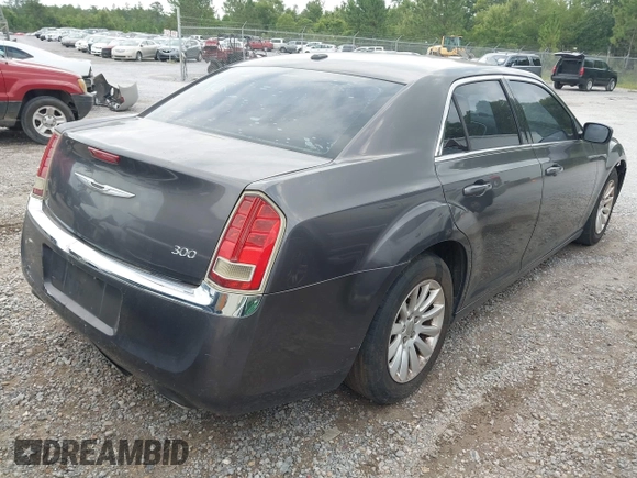 2013 Chrysler 300 with VIN 2C3CCAAG4DH588190, listed as a IAAI auction lot 42476895 with 224,837 mi miles and . Bid and sale history available at DreamBid. Image 4.
