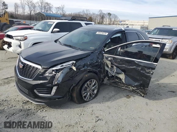 2023 Cadillac XT5 FWD Premium Luxury z VIN 1GYKNCRS6PZ145494, wystawiony jako Copart lot #45475375 z przebiegiem 48 339 mil mil oraz Szkoda całkowita • Salvage title. Historia ofert i sprzedaży dostępna na DreamBid. Obrazek 1.