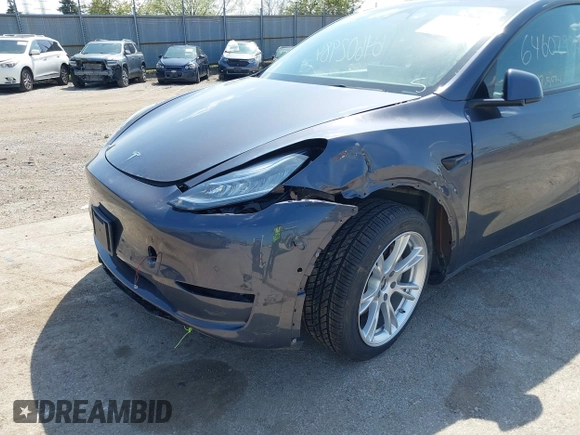 2022 Tesla Model Y Long Range with VIN 7SAYGDEE3NA007737, listed as a IAAI auction lot 42128359 with 42,597 mi miles and . Bid and sale history available at carsss.com. Image 6.