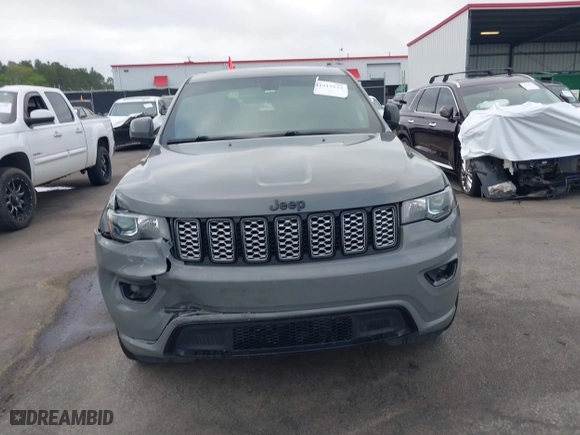 2021 Jeep Grand Cherokee Laredo X with VIN 1C4RJEAG4MC597302, listed as a IAAI auction lot 41919123 with 63,849 mi miles. Bid and sale history available at carsss.com. Image 12.