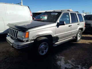 1997 Jeep Grand Cherokee Limited with VIN 1J4GZ78Y4VC568288, listed as a Copart auction lot 88265025 with 185,015 mi miles and Salvage Title. Bid and sale history available at carsss.com. Image 1.