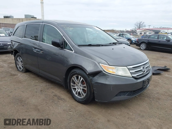 2012 Honda Odyssey EX-L with VIN 5FNRL5H65CB042898, listed as a IAAI auction lot 41784075 with 179,596 mi miles and . Bid and sale history available at carsss.com. Image 1.