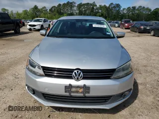 2012 Volkswagen Jetta SEL with VIN 3VWLP7AJ7CM300738, listed as a Copart auction lot 47934894 with 137,877 mi miles and Salvage title. Bid and sale history available at DreamBid. Image 5.