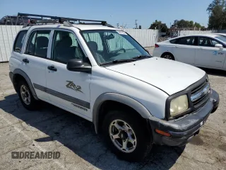 2001 Chevrolet Tracker ZR2 z VIN 2CNBJ734816935414, wystawiony jako Copart lot #54877235 z przebiegiem 117 483 mil mil oraz Szkoda całkowita • Salvage title. Historia ofert i sprzedaży dostępna na DreamBid. Obrazek 4.