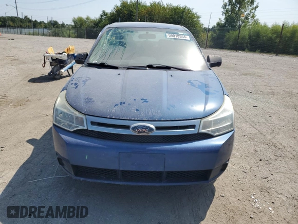 2009 Ford Focus SE with VIN 1FAHP35N69W173977, listed as a Copart auction lot 69018554 with 138,496 mi miles and Salvage Title. Bid and sale history available at DreamBid. Image 5.
