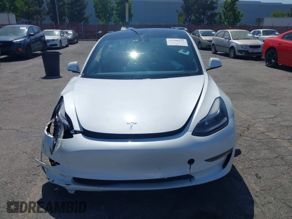 2023 Tesla Model 3 with VIN 5YJ3E1EA0PF621448, listed as a IAAI auction lot 42500155 with 26,589 mi miles and . Bid and sale history available at DreamBid. Image 13.
