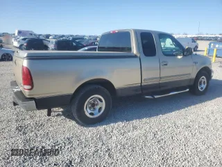 1999 Ford F-150 with VIN 1FTRX17W9XNB77873, listed as a Copart auction lot 52851065 with Not provided miles and Salvage title. Bid and sale history available at DreamBid. Image 3.
