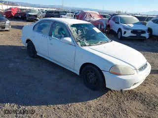 1998 Honda Civic LX with VIN 2HGEJ6675WH553663, listed as a IAAI auction lot 41062394 with 117,514 mi miles. Bid and sale history available at carsss.com. Image 1.