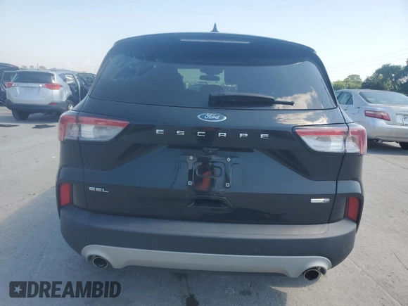 2020 Ford Escape SEL with VIN 1FMCU9H66LUB77448, listed as a Copart auction lot 61697275 with 70,997 mi miles and Salvage title. Bid and sale history available at DreamBid. Image 6.