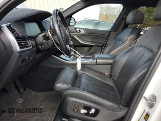 2020 BMW X5 xDrive40i with VIN 5UXCR6C04L9B36134, listed as a Copart auction lot 52220665 with 51,285 mi miles and Salvage title. Bid and sale history available at DreamBid. Image 7.