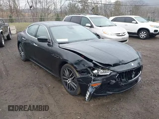 2017 Maserati Ghibli with VIN ZAM57XSA3H1197716, listed as a IAAI auction lot 41918916 with 47,779 mi miles. Bid and sale history available at carsss.com. Image 1.