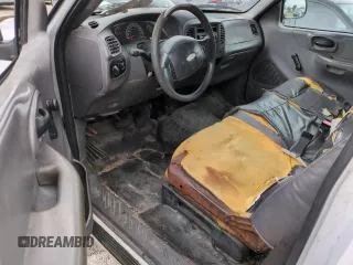 2003 Ford F-150 XL with VIN 1FTRF17W03NA02988, listed as a Copart auction lot 77209084 with Not Provided miles and Salvage Title. Bid and sale history available at DreamBid. Image 8.