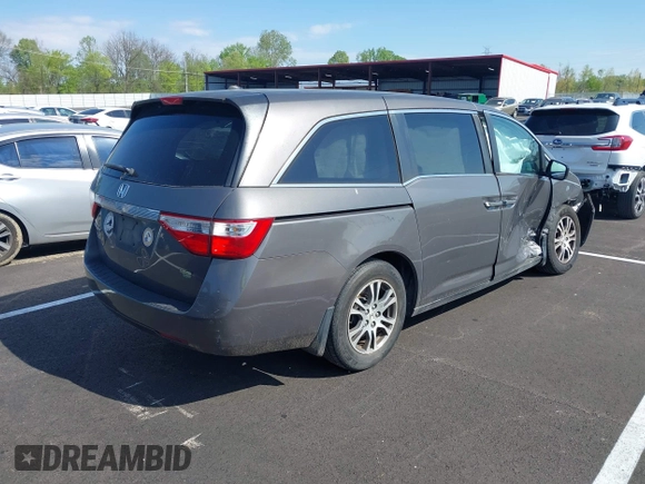 2011 Honda Odyssey EX-L with VIN 5FNRL5H62BB058765, listed as a IAAI auction lot 42017802 with 178,512 mi miles and . Bid and sale history available at carsss.com. Image 4.
