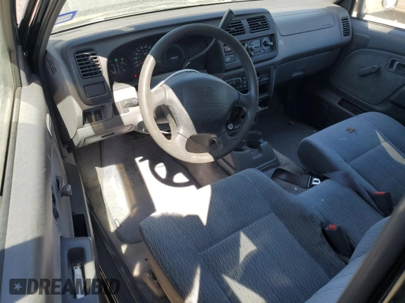 1999 Nissan Frontier XE with VIN 1N6DD26S6XC327079, listed as a Copart auction lot 49295335 with 170,753 mi miles and Salvage title. Bid and sale history available at DreamBid. Image 8.