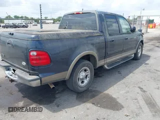 2001 Ford F-150 XLT z VIN 1FTRW07W61KA23644, wystawiony jako IAAI lot #42162523 z przebiegiem 203 636 mil mil oraz . Historia ofert i sprzedaży dostępna na DreamBid. Obrazek 4.