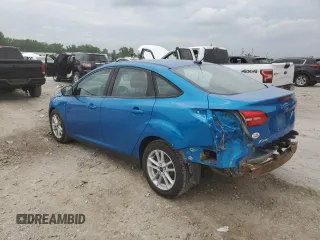 2017 Ford Focus SE with VIN 1FADP3F21HL219573, listed as a Copart auction lot 59147985 with 160,213 mi miles and Salvage title. Bid and sale history available at DreamBid. Image 2.