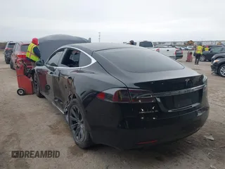 2018 Tesla Model S 75D with VIN 5YJSA1E22JF282828, listed as a IAAI auction lot 41595543 with 72,571 mi miles and . Bid and sale history available at DreamBid. Image 3.