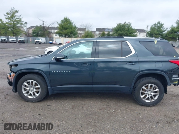 2018 Chevrolet Traverse LT Cloth z VIN 1GNEVGKW7JJ156198, wystawiony jako IAAI lot #41909259 z przebiegiem 82 719 mil mil oraz . Historia ofert i sprzedaży dostępna na DreamBid. Obrazek 15.
