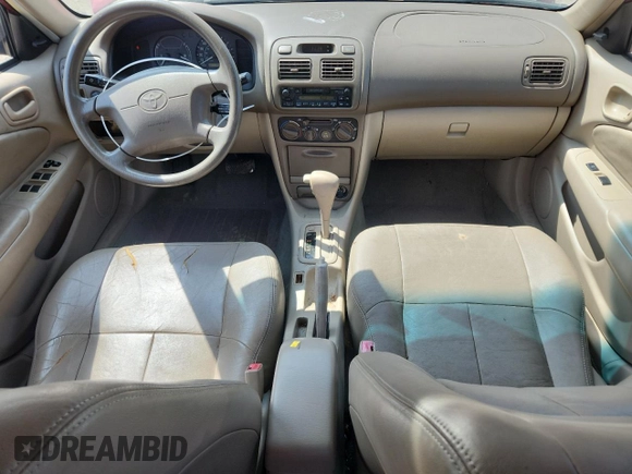 1999 Toyota Corolla VE z VIN 1NXBR12E3XZ172308, wystawiony jako Copart lot #65783485 z przebiegiem 74 333 mil mil oraz Nie do naprawy • Non repairable. Historia ofert i sprzedaży dostępna na DreamBid. Obrazek 8.