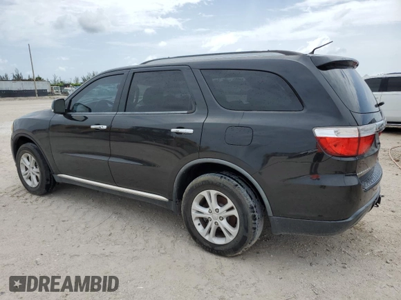 2013 Dodge Durango Crew with VIN 1C4RDHDG6DC657438, listed as a Copart auction lot 62883675 with 129,500 mi miles and Clean title. Bid and sale history available at DreamBid. Image 2.