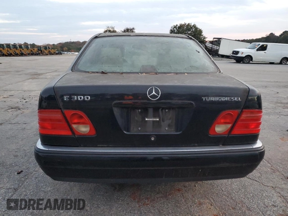 1998 Mercedes-Benz E 320 with VIN WDBJF25F0WA684027, listed as a Copart auction lot 82171114 with 259,427 mi miles and Salvage Title. Bid and sale history available at DreamBid. Image 6.