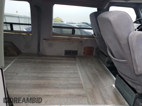 1998 Dodge Cargo Conversion z VIN 2B6HB11Y0WK115037, wystawiony jako Copart lot #85734654 z przebiegiem 142 861 mil mil oraz Nie do naprawy • Non repairable. Historia ofert i sprzedaży dostępna na DreamBid. Obrazek 10.
