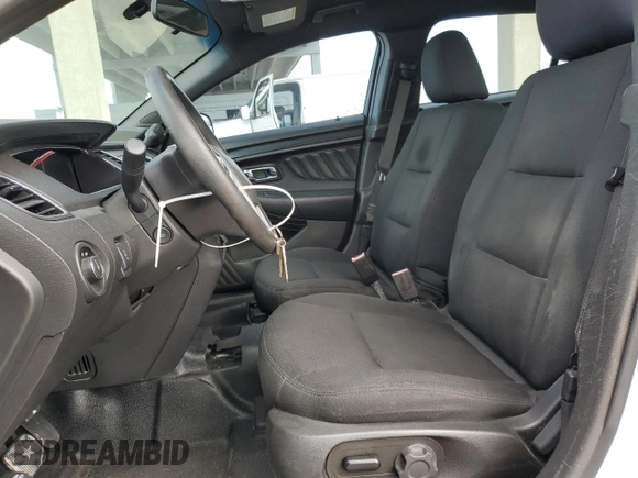 2015 Ford Police Interceptor with VIN 1FAHP2L82FG203554, listed as a Copart auction lot 73117244 with 99,385 mi miles and Clean title. Bid and sale history available at DreamBid. Image 7.
